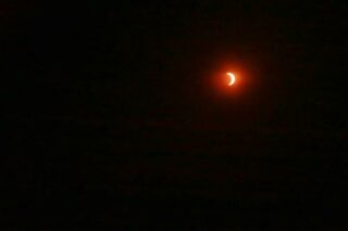 When you witness them briefly trying to close the off the man hole above you.
An eclipse, they call it.